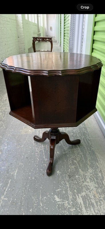 Mahogany octagonal revolving bookcase table with Queen Anne-style cabriole legs gallery